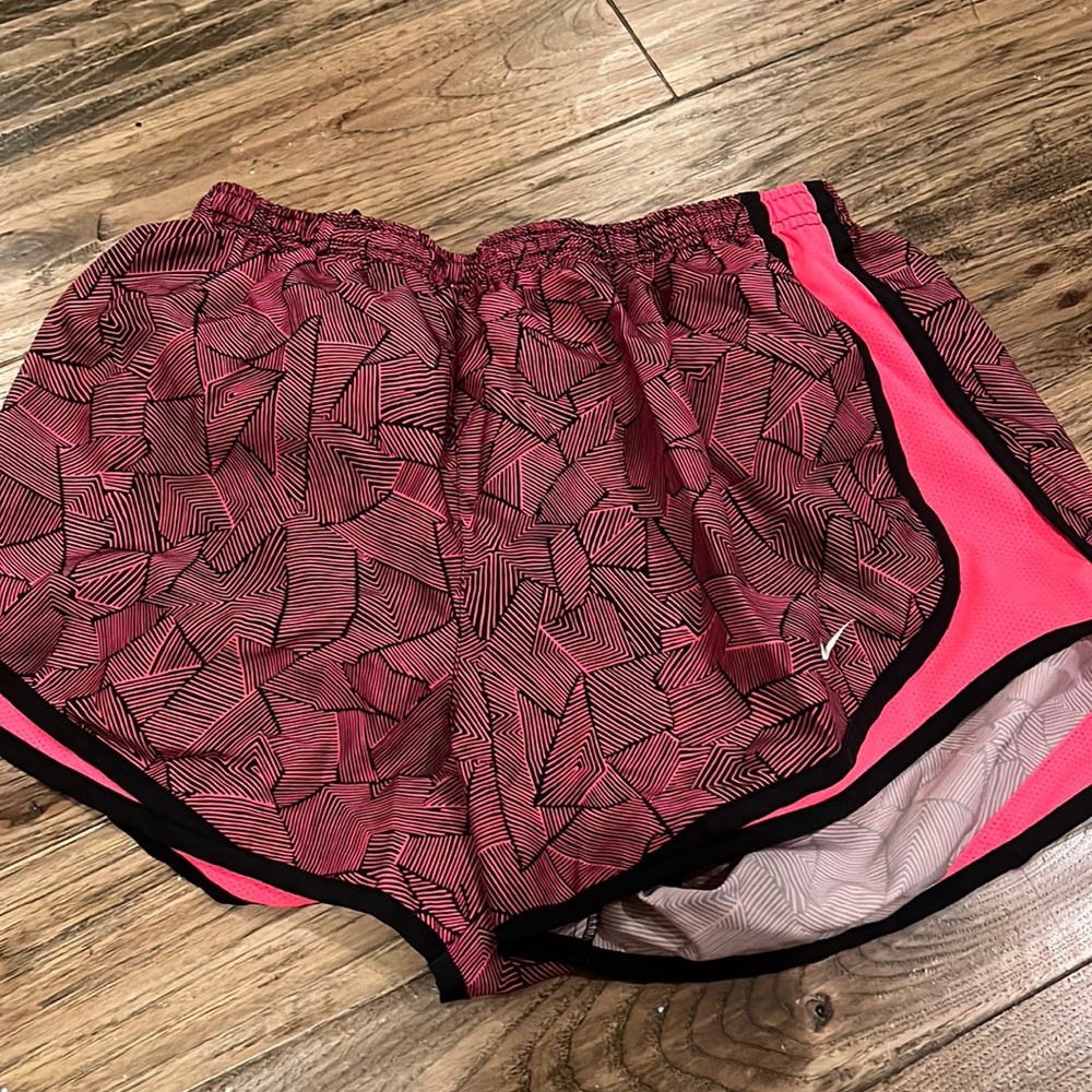 Pink Nike shorts